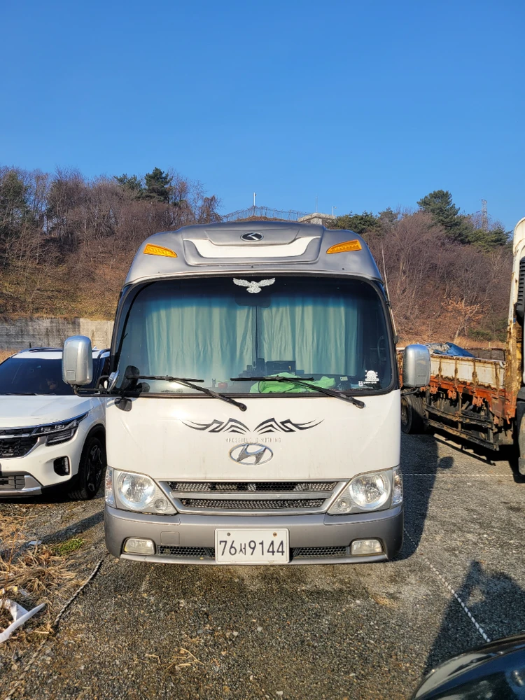 09년식 e-카운티 롱바디 4인승 캠핑카